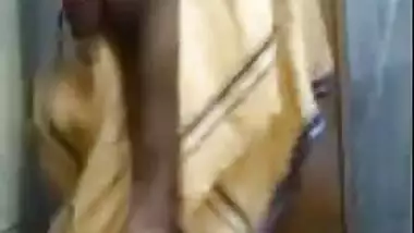 Aunty pisses and scores her own muff with XXX toy before showering