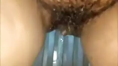 Masked Desi gal masturbates with XXX toy and ends solo sex with pissing