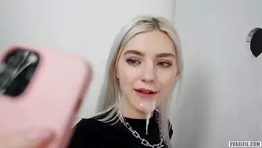 Teen slut got a huge cumshot on her face through the glory hole - Eva Elfie