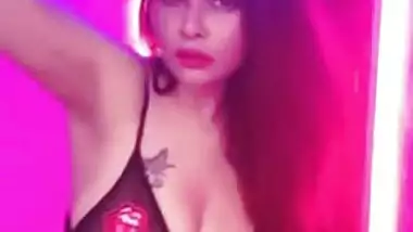Enticing young woman reveals private parts posing in XXX lingerie