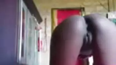 Village chick hikes up dress to reveal her XXX ass and pussy online