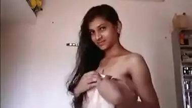 Whore exposes her XXX titties and hairy pussy in amateur sex video