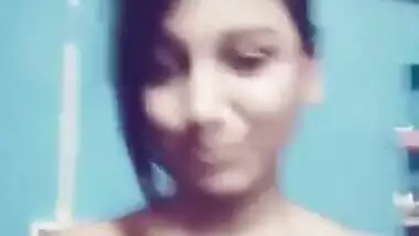 XXX whore with naked boobs takes shorts off exposing ass to Desi fans