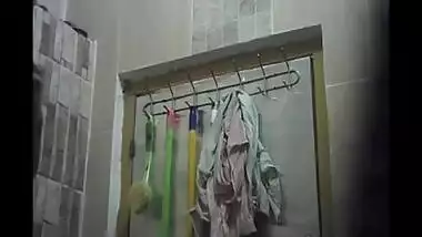 Young girl Naked Big Boobs and Hairy Pussy captured by spycam while bathing