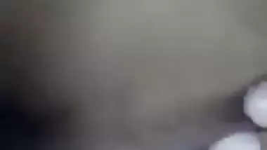 Lovely Desi teens talks on phone with BF and fingers own XXX pussy
