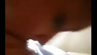 Indian sex movie scene of a pretty gal giving a orall-service to boyfriend