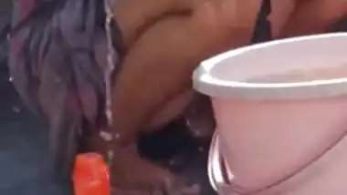 Chubby Desi bhabhi poses for XXX video when bathing topless outdoors