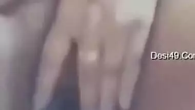 Desi girl entertains herself behind close door and online fans as well